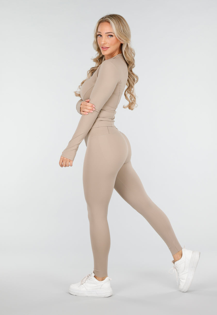 Beige Sportset met Strakke Fit en Ritssluiting Top