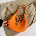 Ronde Oranje Lederlook Tas