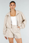 Beige Two Piece Set met Zwarte Stippen en Lange Mouwen