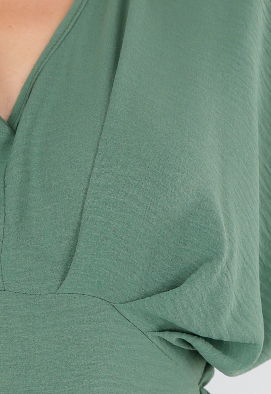 Groene Wijde Jumpsuit met V-Hals en Striksluiting op de Rug