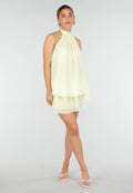 Butter Yellow Halter Jurk met Gelaagde Rok en Open Rug