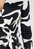 Zwart-Witte Stretch Jumpsuit met Print en Overslagtop