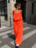 Neon Oranje Stretch Two Piece Set met Mouwloze Top en Wide Leg Broek