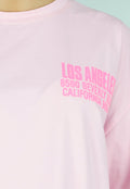 Roze Oversized T-shirt met Tekstprint en Korte Mouwen