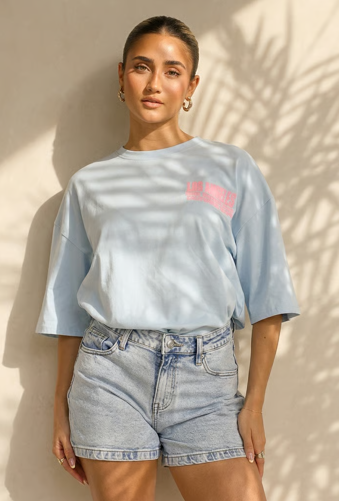 Lichtblauw T-shirt met Roze Print en Korte Mouwen en Ronde Hals