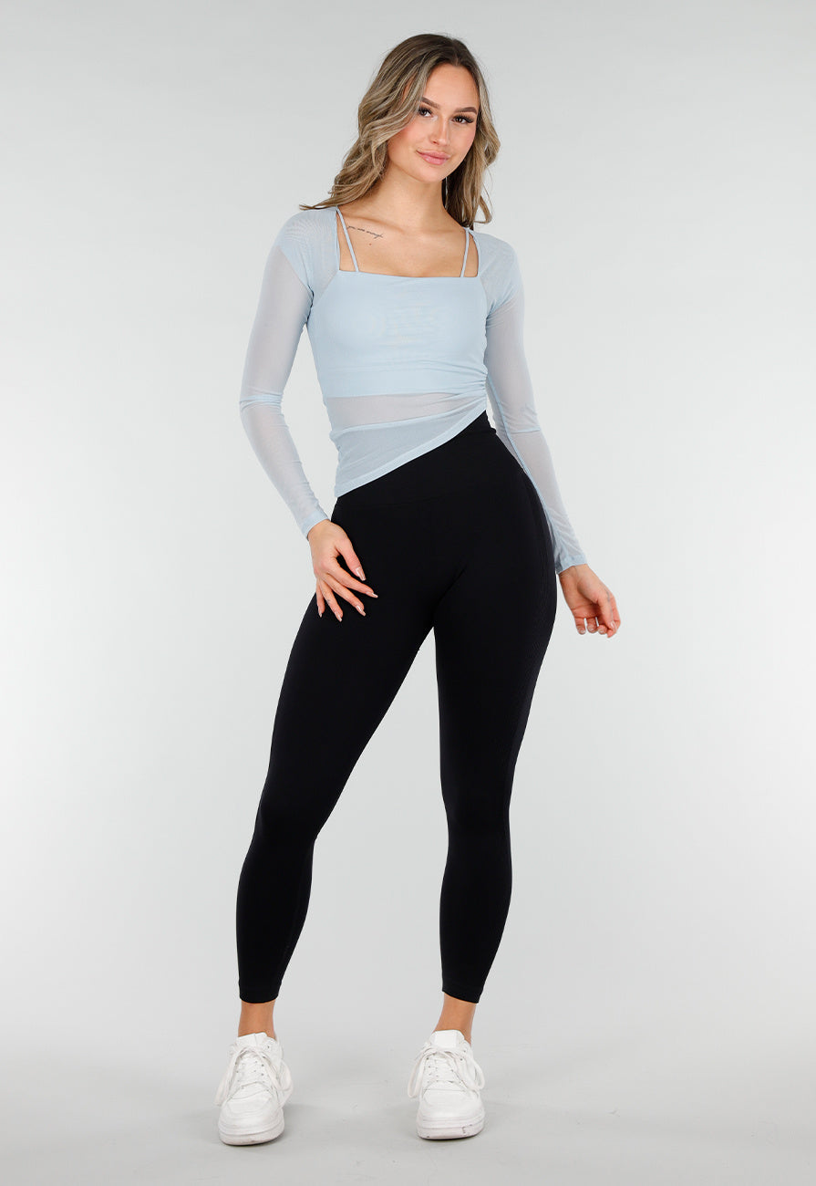Lichtblauwe Asymmetrische Mesh Top met Lange Mouwen en Pads