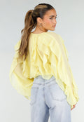 Gele Chiffon Blouse met Ruffles Lange Mouwen en Knopen