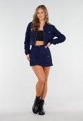 Navy Set met Cropped Bomberjasje en Skort met Zakken