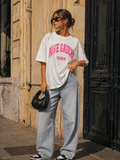 Wit Oversized T-Shirt met Grote Roze Tekstprint