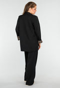 Elegant Zwart Pak met Leopardprint Accenten