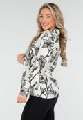 Witte Blouse met Zwarte Bloemenprint en Lange Mouwen