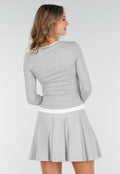 Grijze Longsleeve Top met Witte Boorden aan Hals en Mouwen