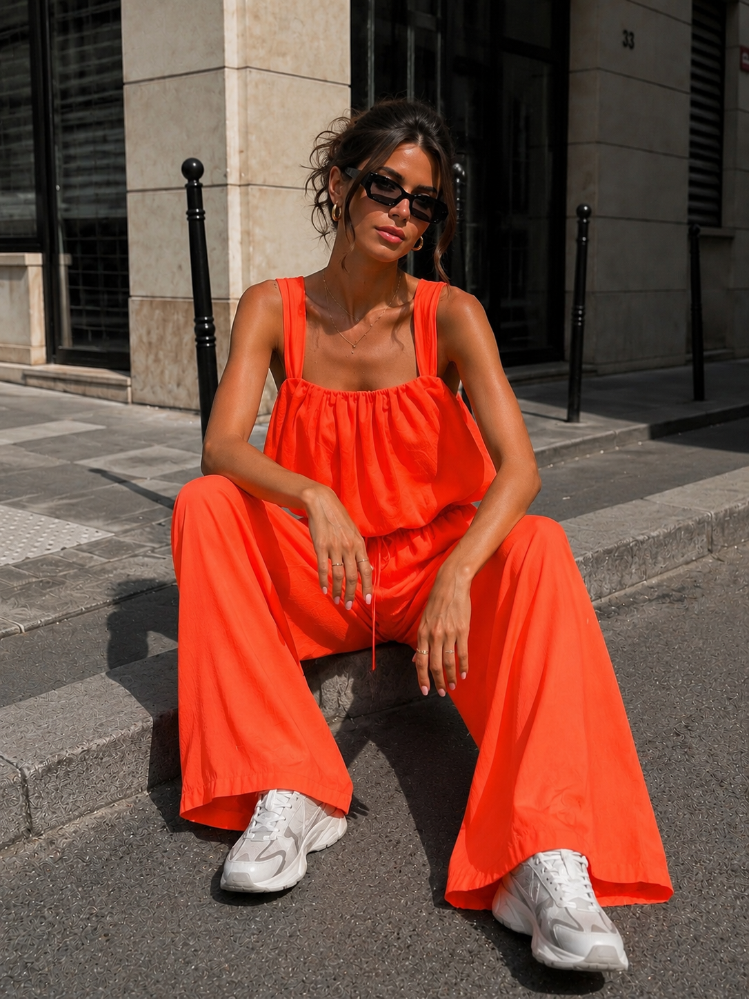 Neon Oranje Stretch Two Piece Set met Mouwloze Top en Wide Leg Broek