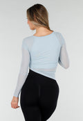 Lichtblauwe Asymmetrische Mesh Top met Lange Mouwen en Pads