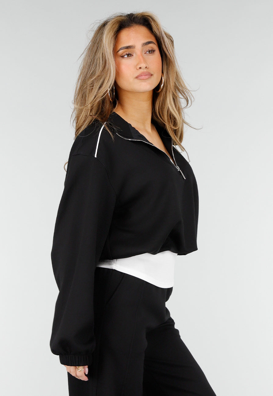 Zwarte Sweater met Halve Rits en Elastische Boorden