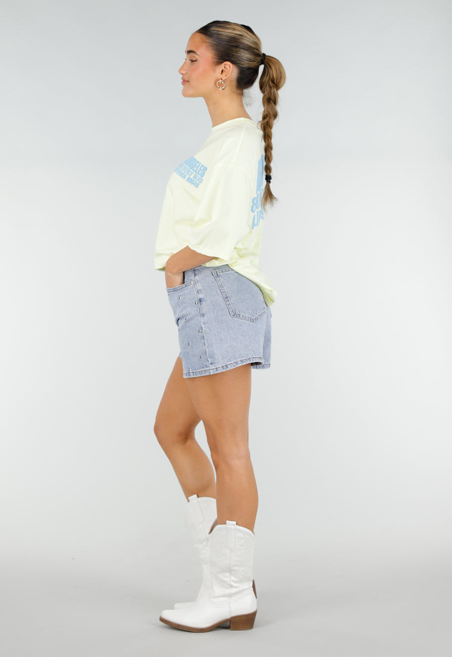 Lichtgeel Oversized T-shirt met Blauwe Tekst en Korte Mouwen