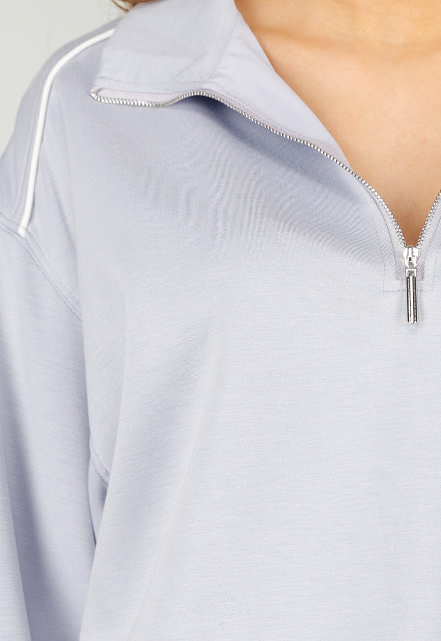 Lichtblauwe Sweater met Halve Rits en Elastische Boorden