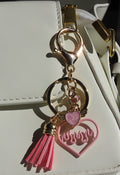 Sleutelhanger in Zwart en Roze met Franjedetails