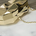 Kleine Metallic Clutch