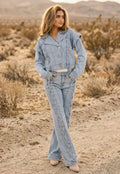 Lichtblauw Denim Jasje met Veterdetails en Ruffle Schouders