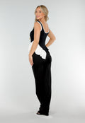 Zwart-Witte Stretch Top met Ronde Hals en Ruffle Detail aan de Zoom