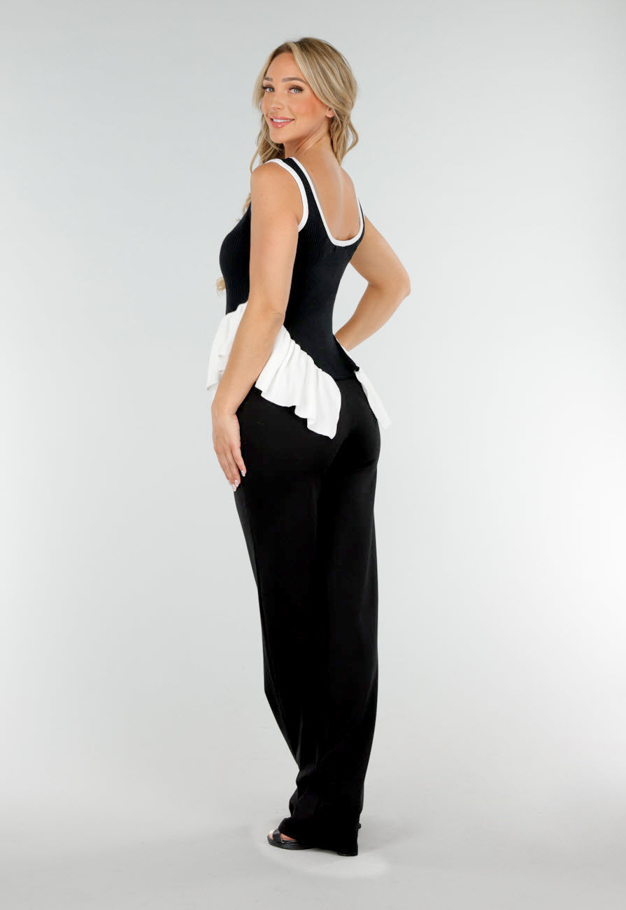Zwart-Witte Stretch Top met Ronde Hals en Ruffle Detail aan de Zoom