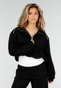 Zwarte Sweater met Halve Rits en Elastische Boorden