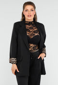 Elegant Zwart Pak met Leopardprint Accenten