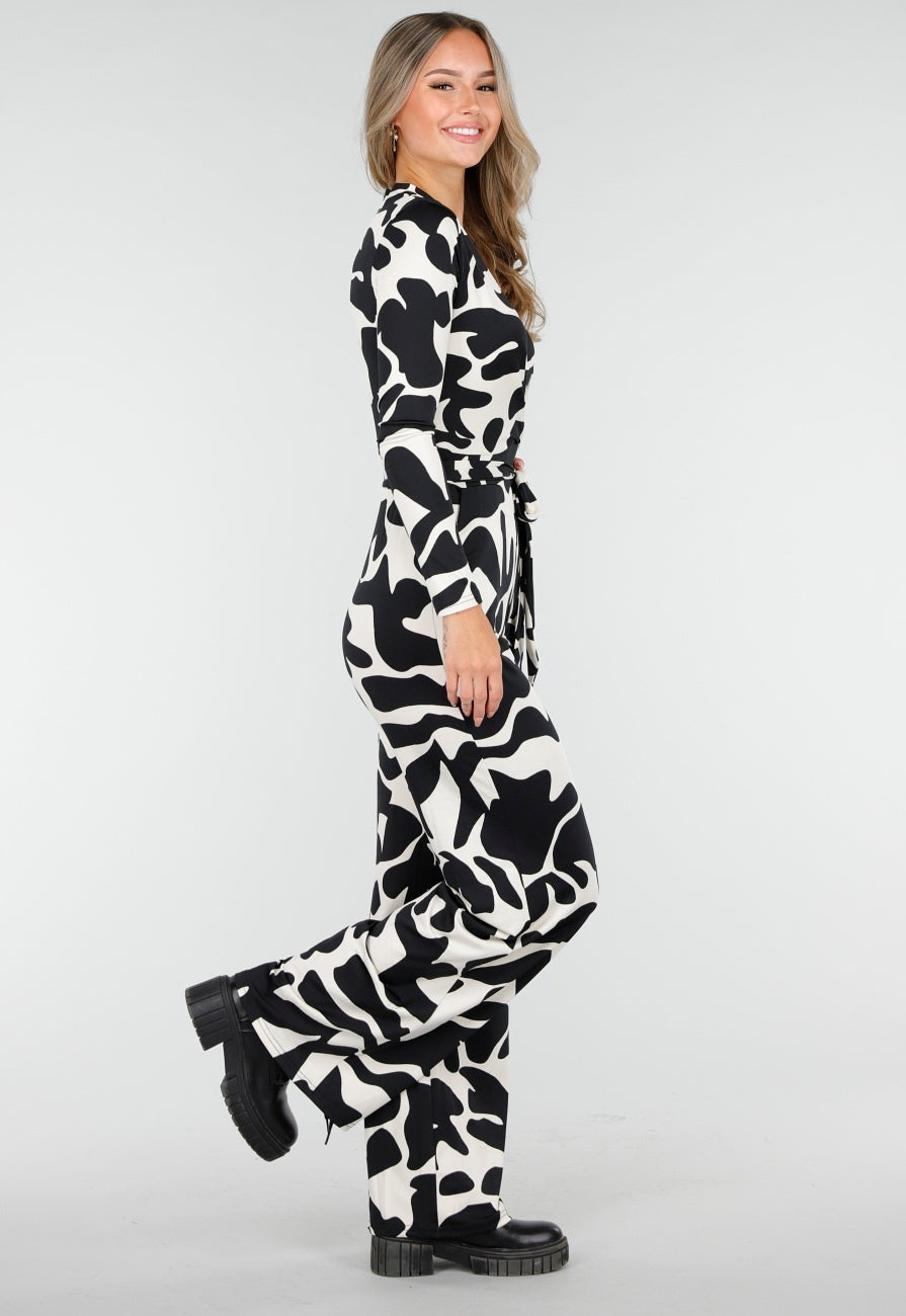 Zwart-Witte Stretch Jumpsuit met Print en Overslagtop