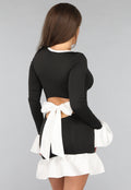 Zwarte Jurk met Witte Ruches Details en Strik