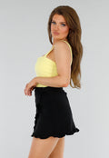 Butter Yellow Bodysuit met Brede Bandjes en V-Halsdetail