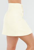 Butter Yellow Mini Rok met Overslag en Goudkleurige Knopen aan Voorkant