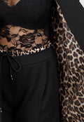 Elegant Zwart Pak met Leopardprint Accenten