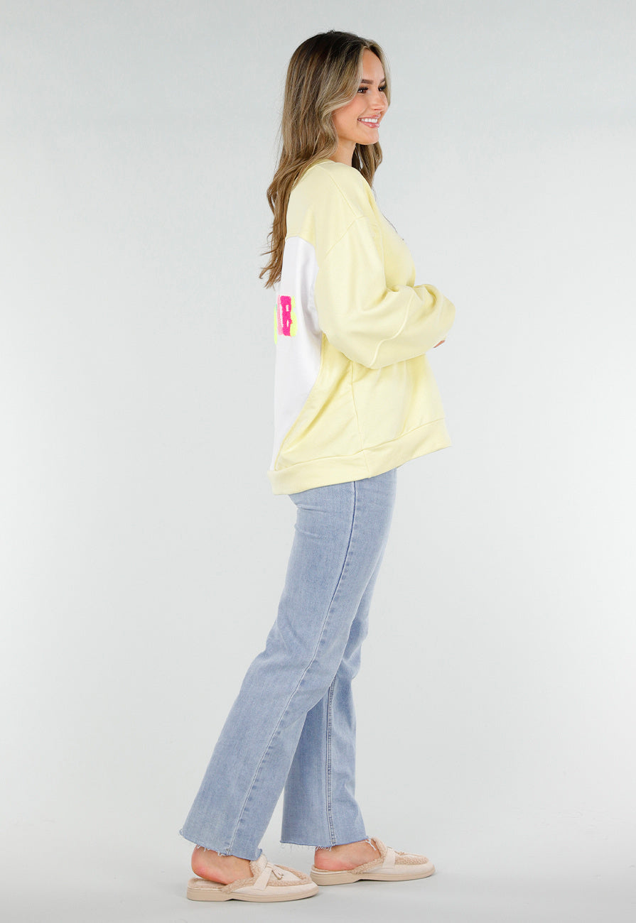 Gele Sweater met Good Vibes Print op Rug