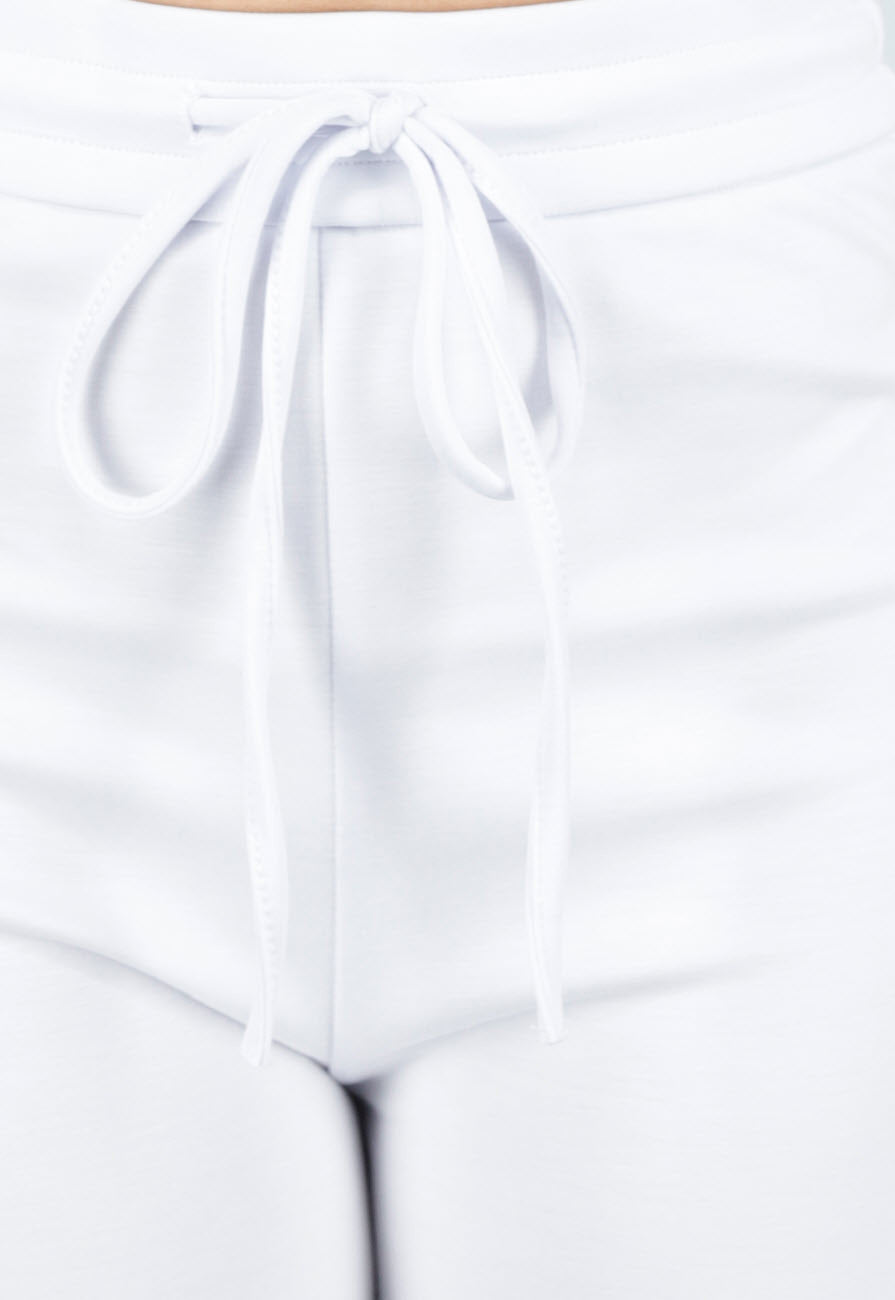 Witte Joggingbroek met Flared Pijpen en Elastische Taille